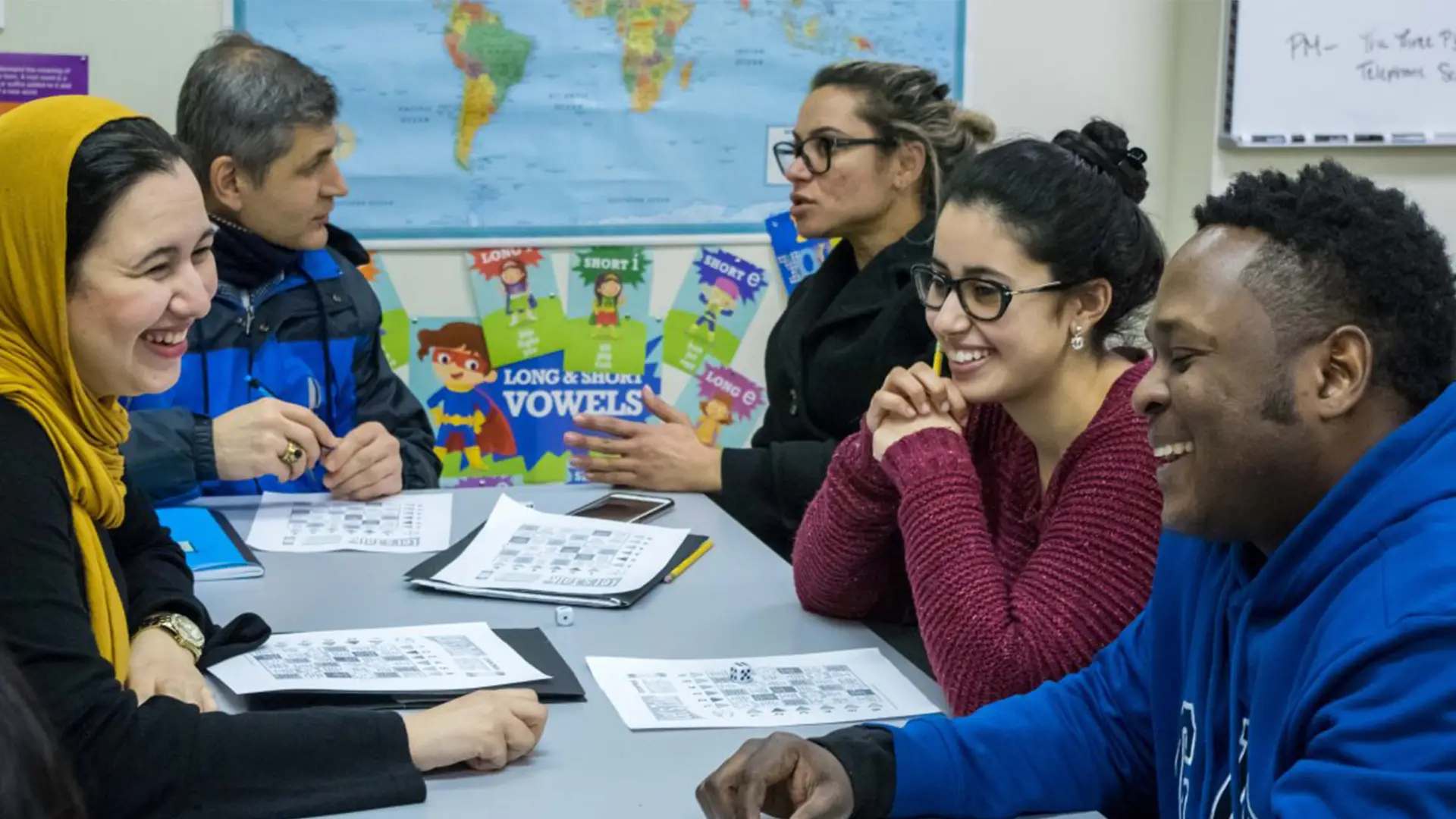 Diverse students sitting around a table